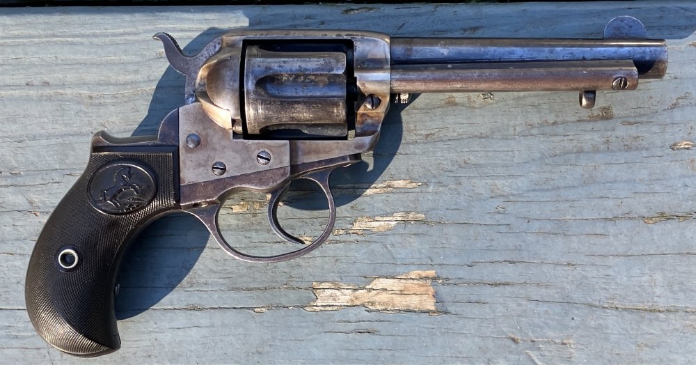 ColtLightningRevolver.thumb.JPG.5fef9d27053baf675e9b83f9bfa7d244.JPG